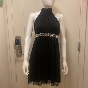 Women CITY STUDIO black dress with details in the waist.Size: M